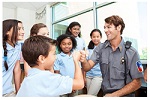 students with a police officer